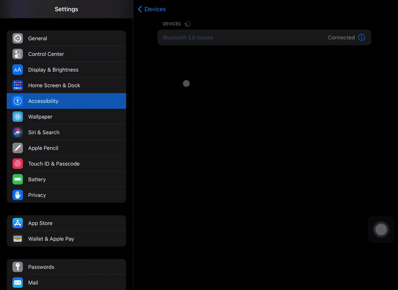 iPad with connected Bluetooth mouse cursor