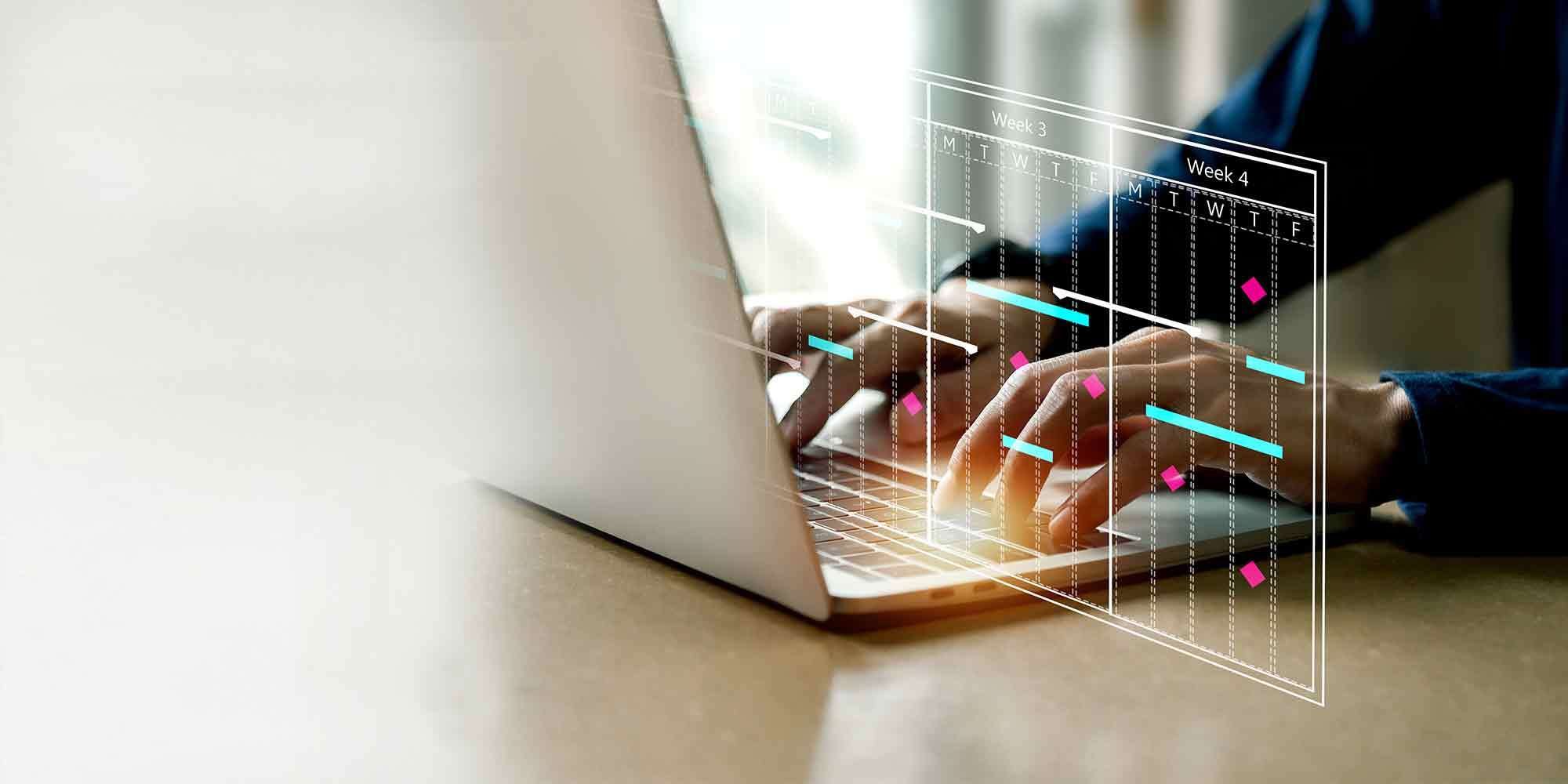 A person scheduling digital signage on their computer