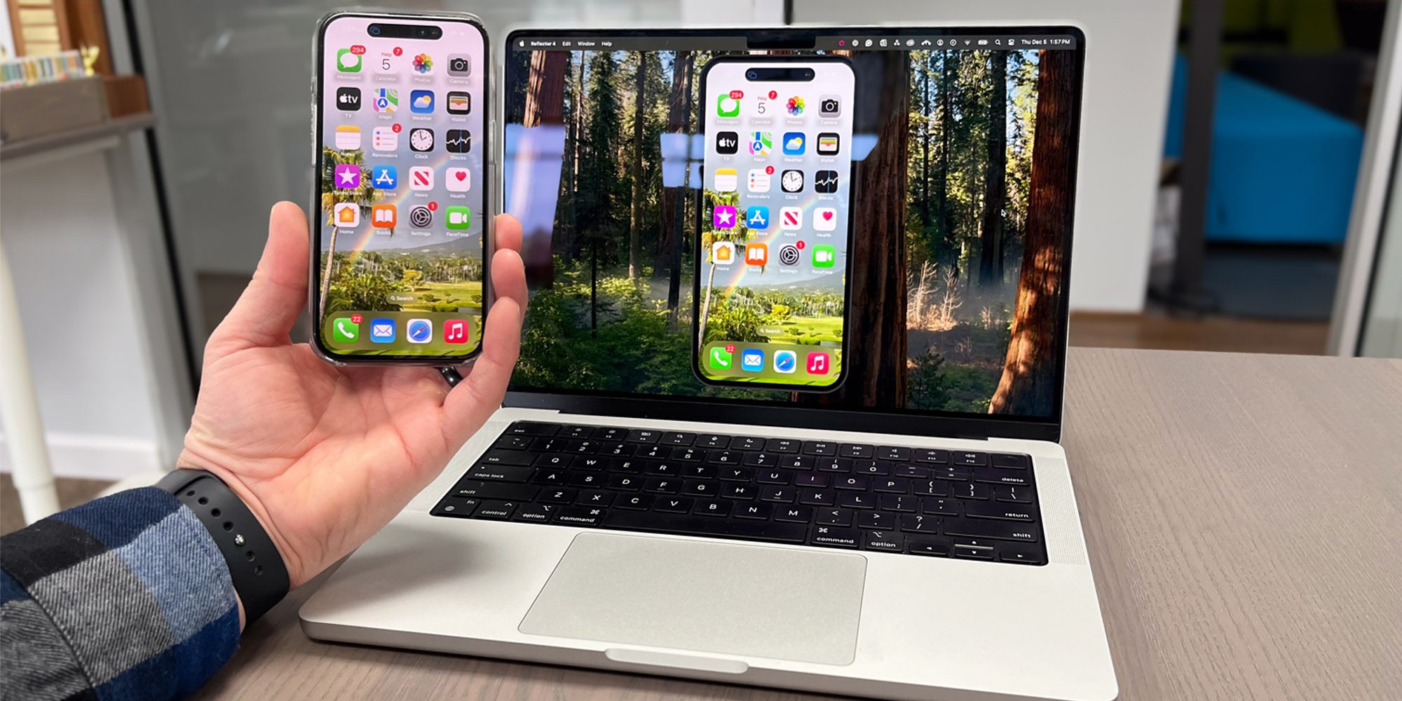 iPhone running iOS 18 screen mirrored to a computer